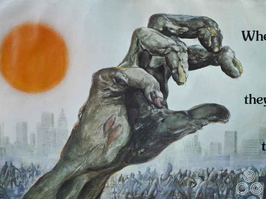 A close-up detail of the Zombie Flesh Eaters quad by Tom Beauvais, 1980
