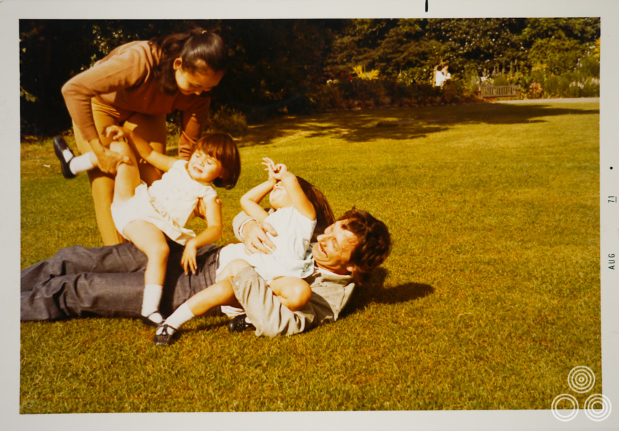 Tom and Shirley Chantrell play with their twin daughters Jaqui and Louise in a park near their house, August 1971.