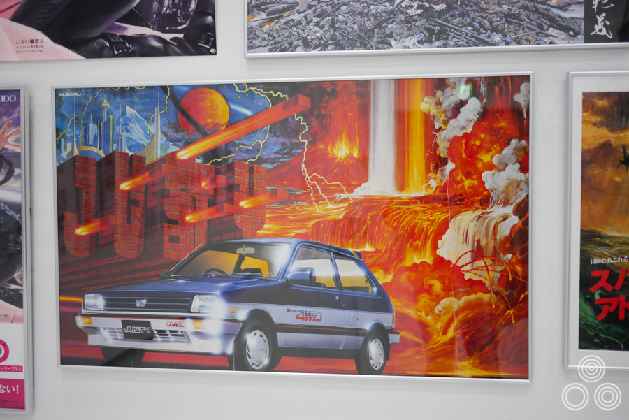 A close-up of a commercial advert for the Subaru Justy that was painted by Ohrai in the 1980s.